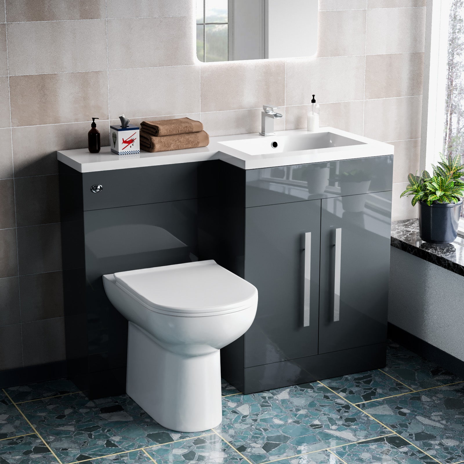Bathroom setup with a gray vanity unit, white toilet, and sink.