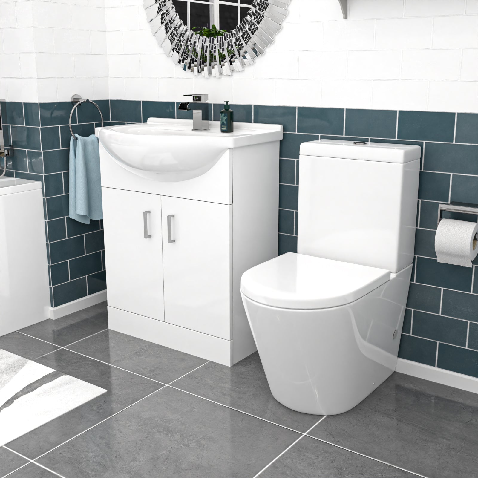 Bathroom setup with white toilet, sink, and vanity unit