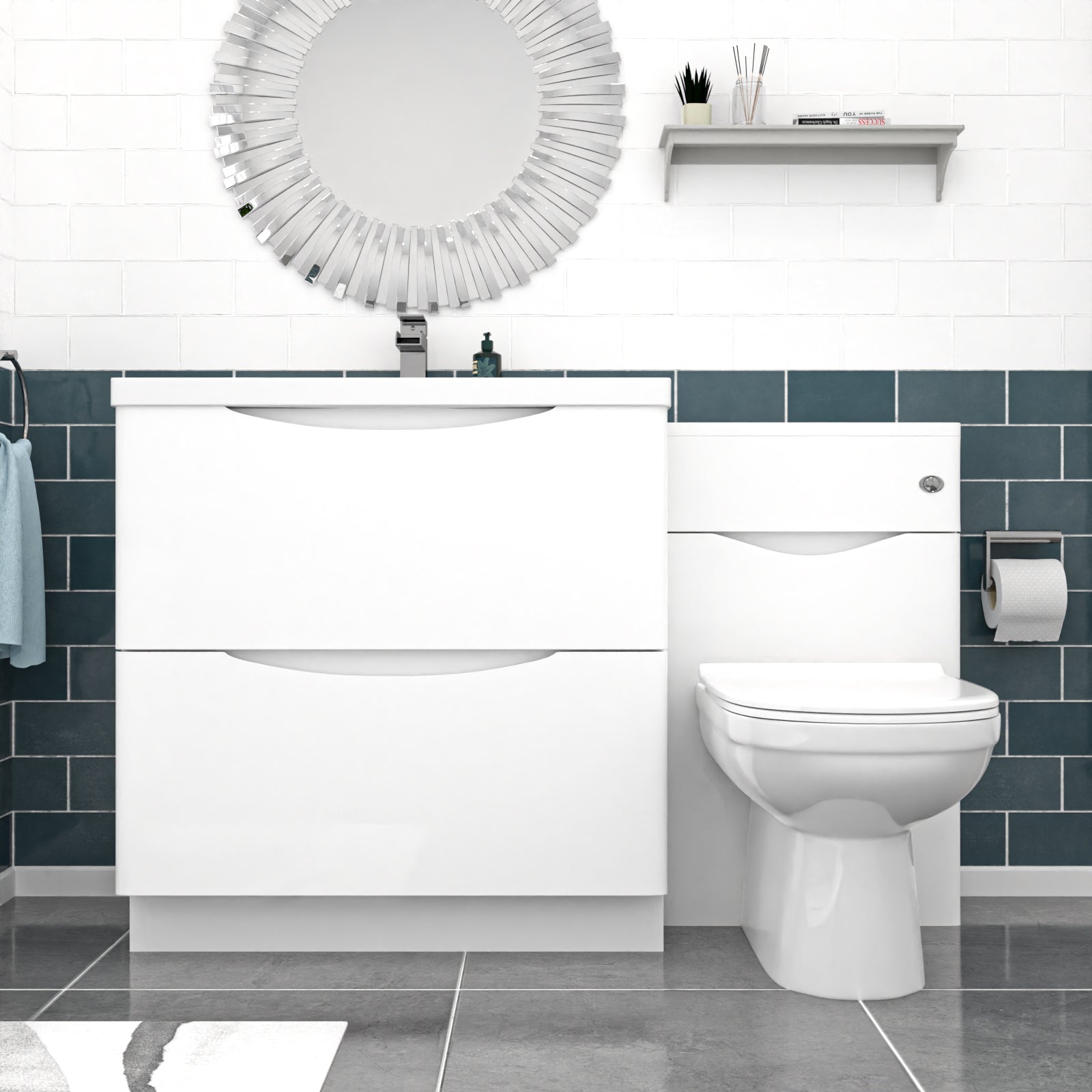 Modern bathroom with white vanity, toilet, and decorative mirror.