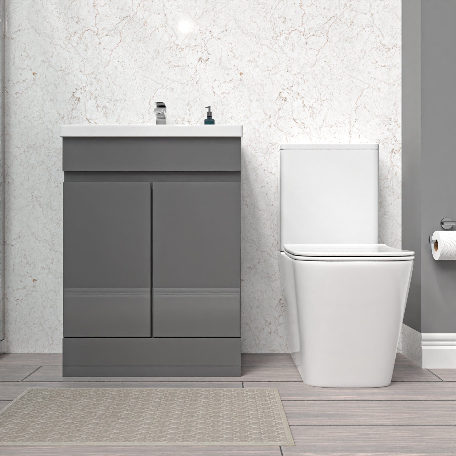 Bathroom setup with a gray vanity unit, white toilet, and mirror.