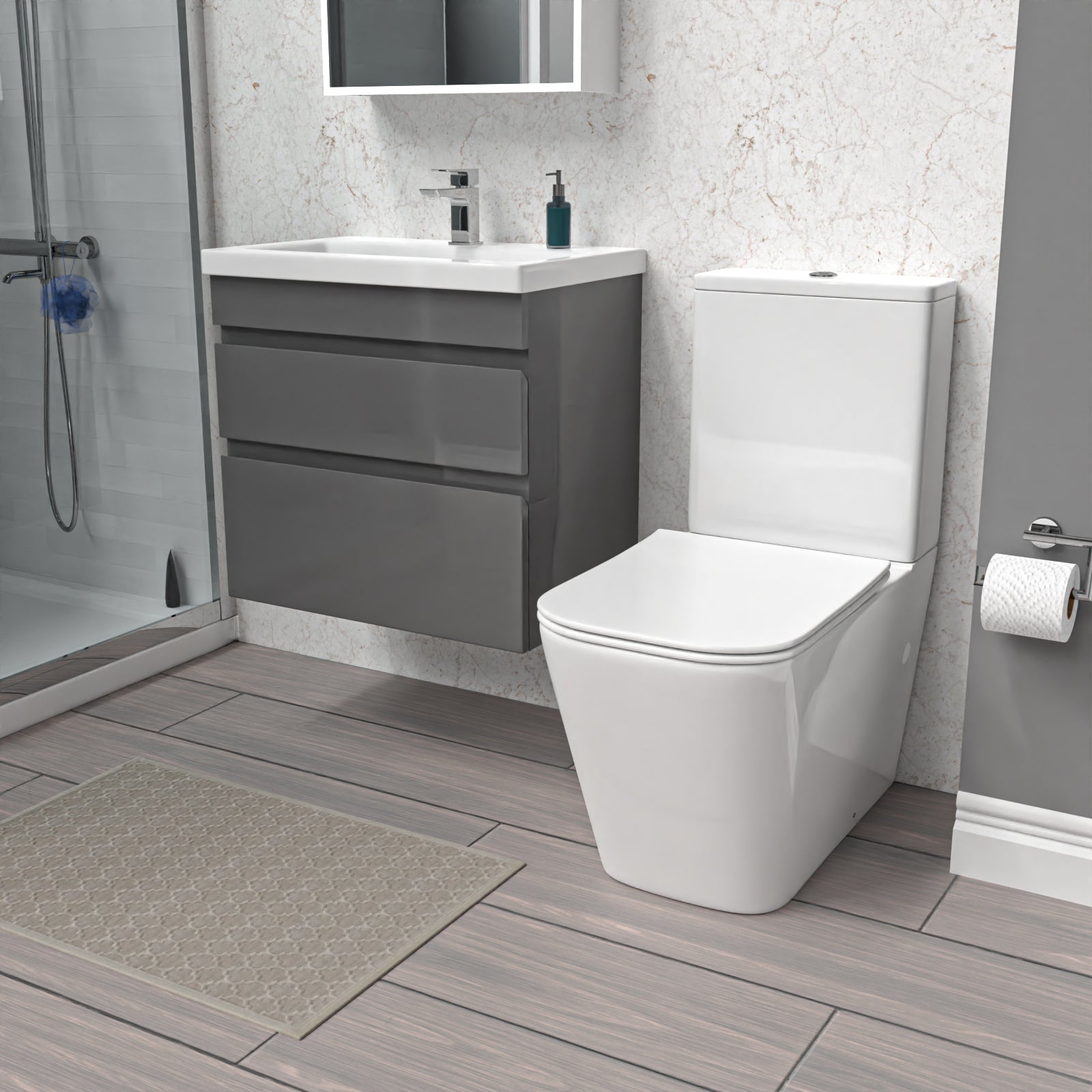 Modern bathroom with gray wall hung vanity, white toilet