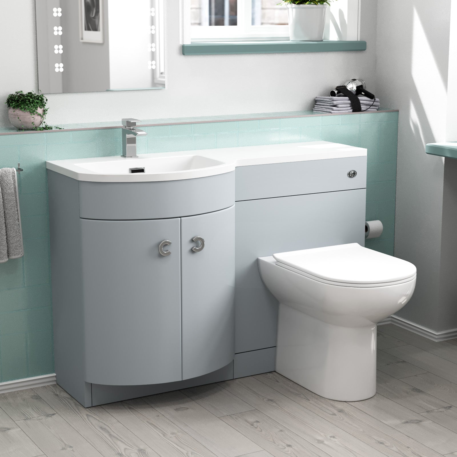 Bathroom setup with gray vanity unit, white sink, and toilet.