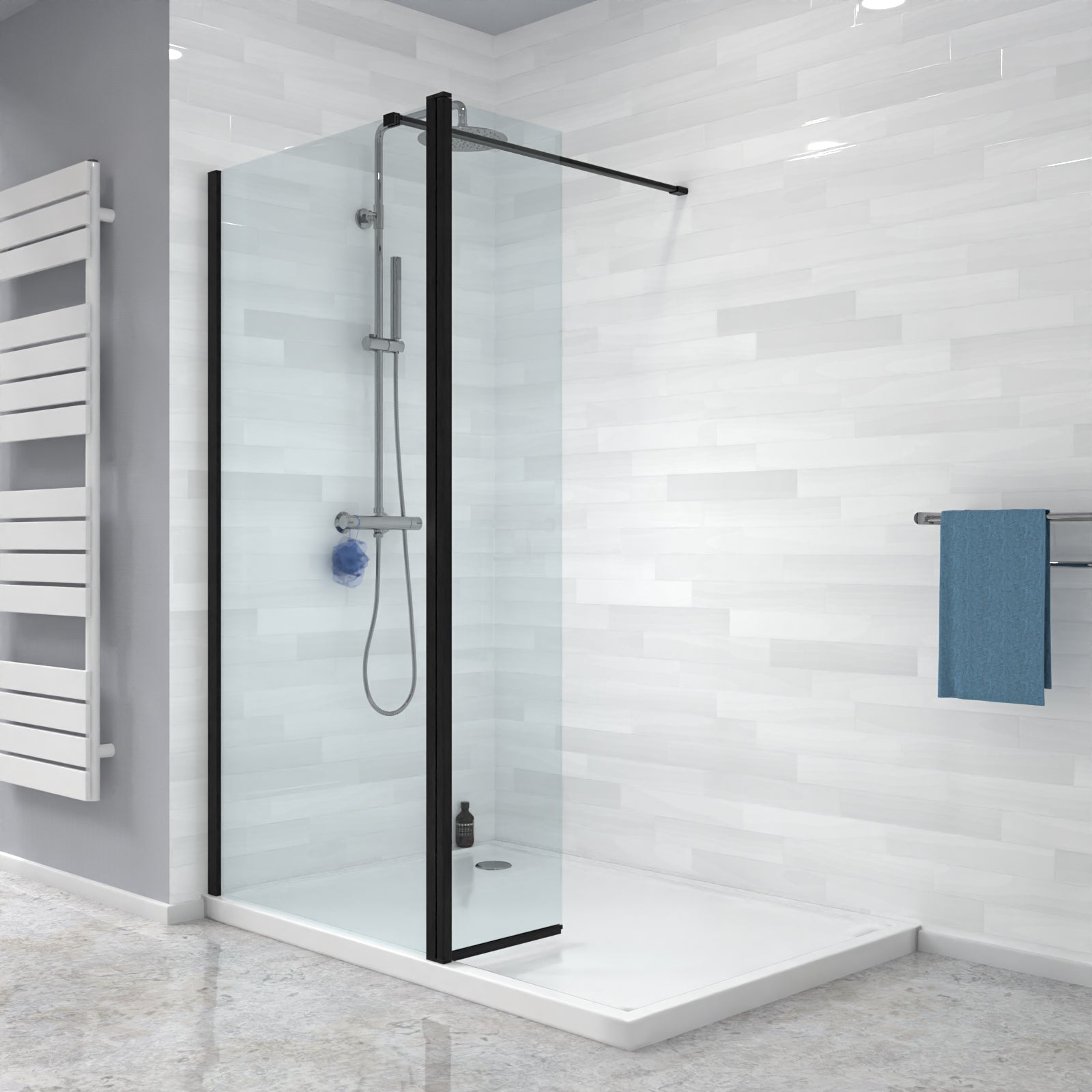 Modern shower enclosure with glass door in a bathroom setting.