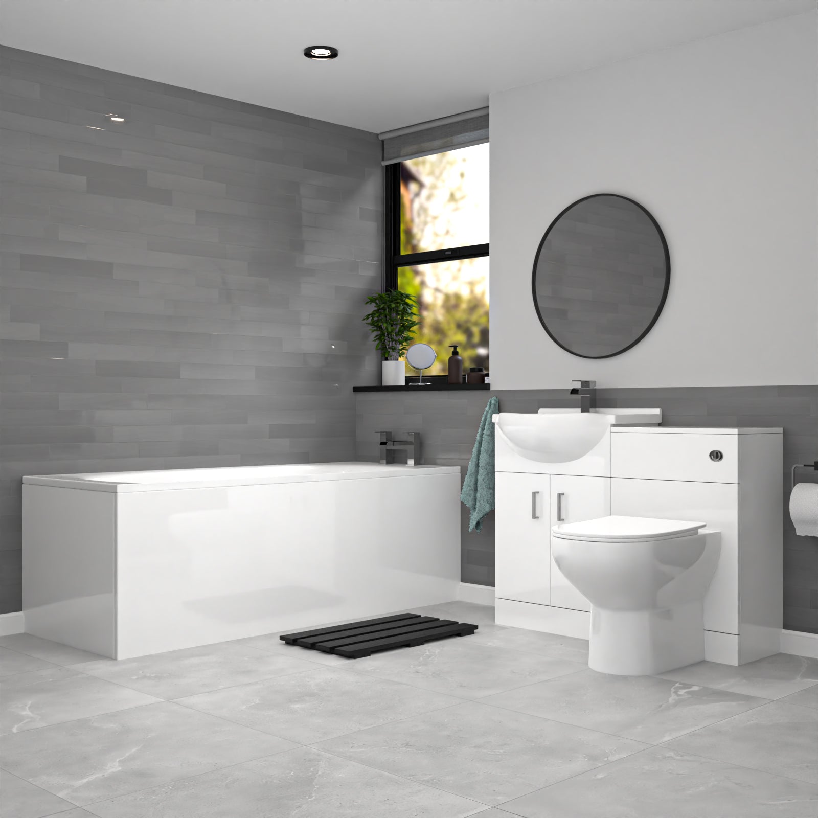 Modern bathroom with white toilet, sink, and bathtub 