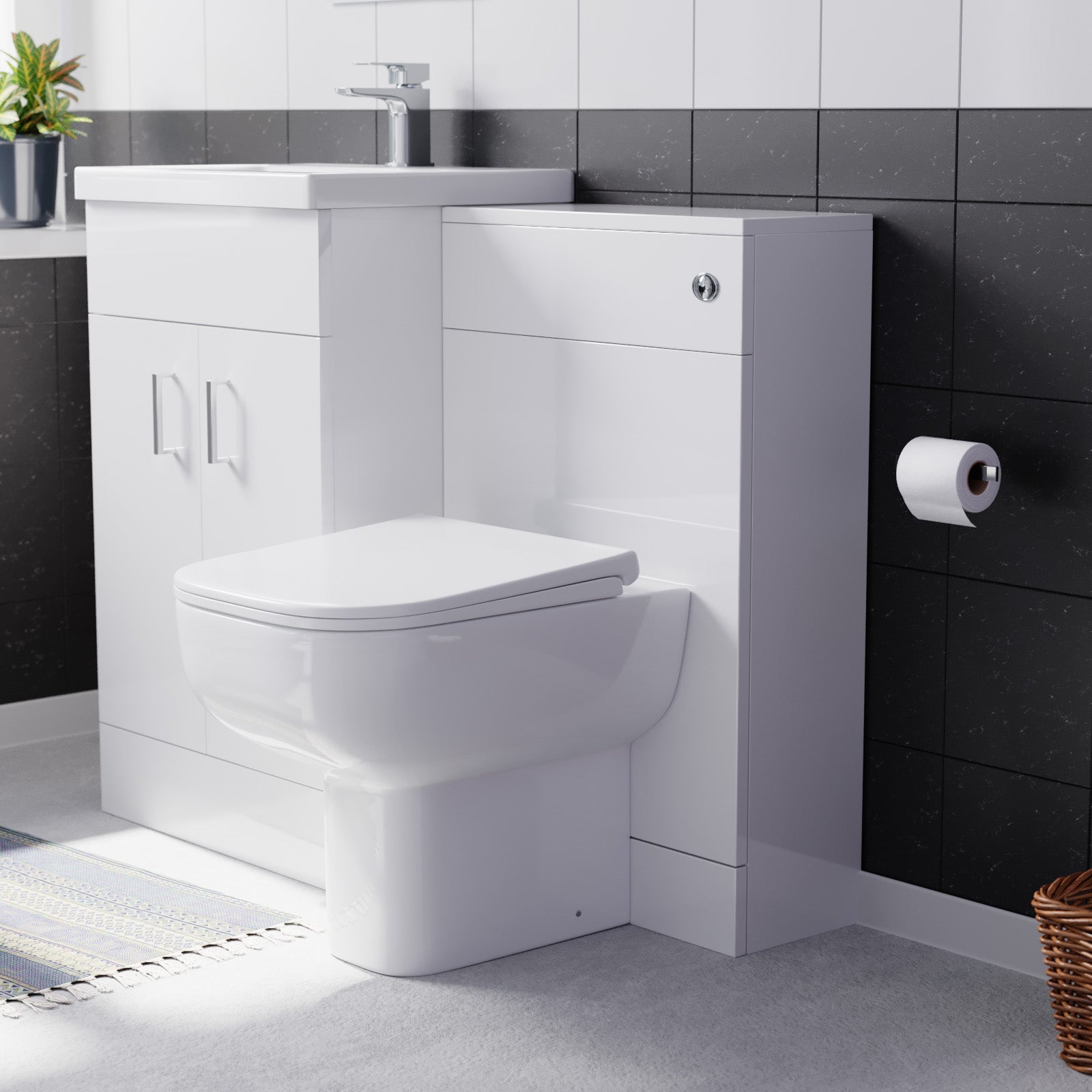 Bathroom setup with a white toilet and sink