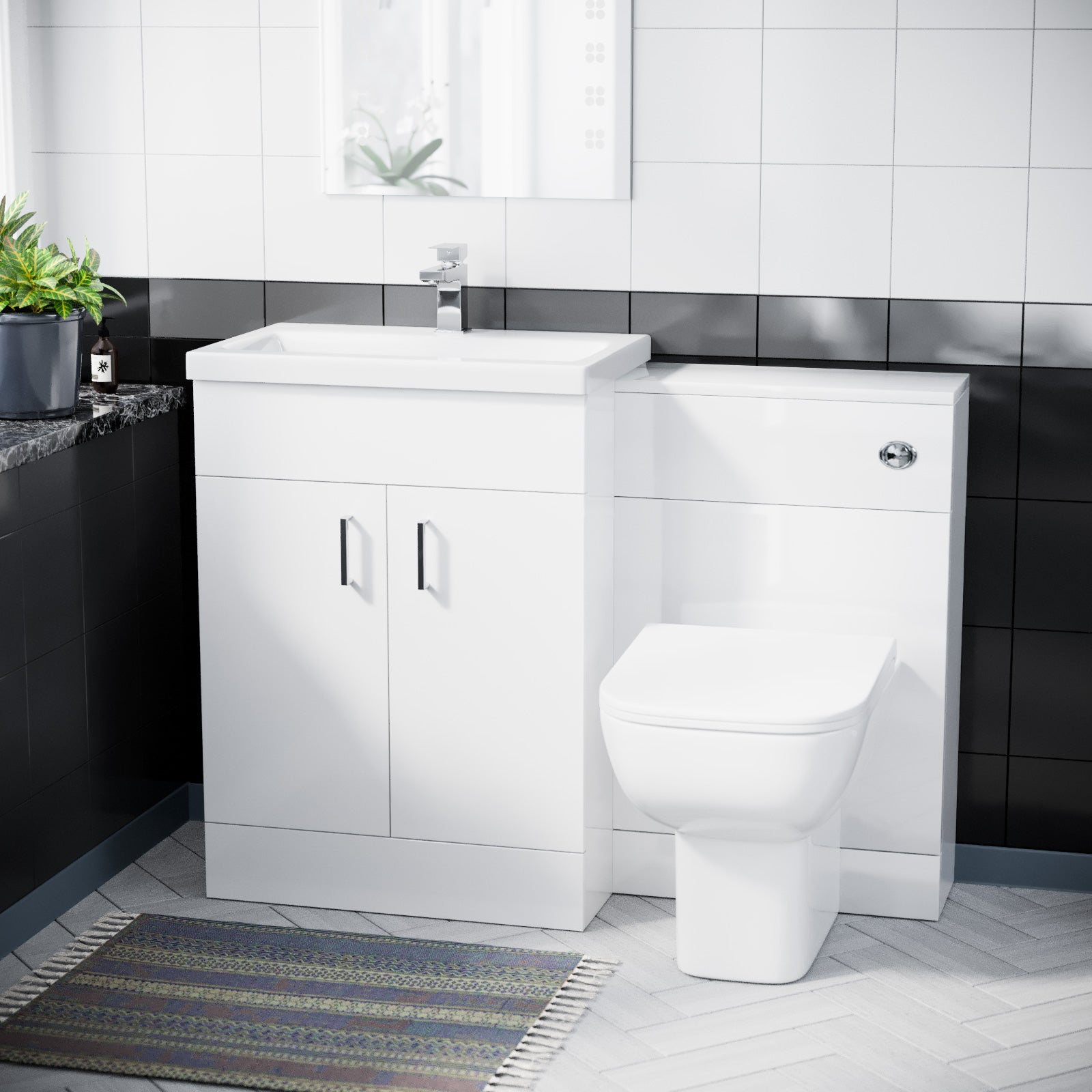 Bathroom setup with a white vanity unit and toilet