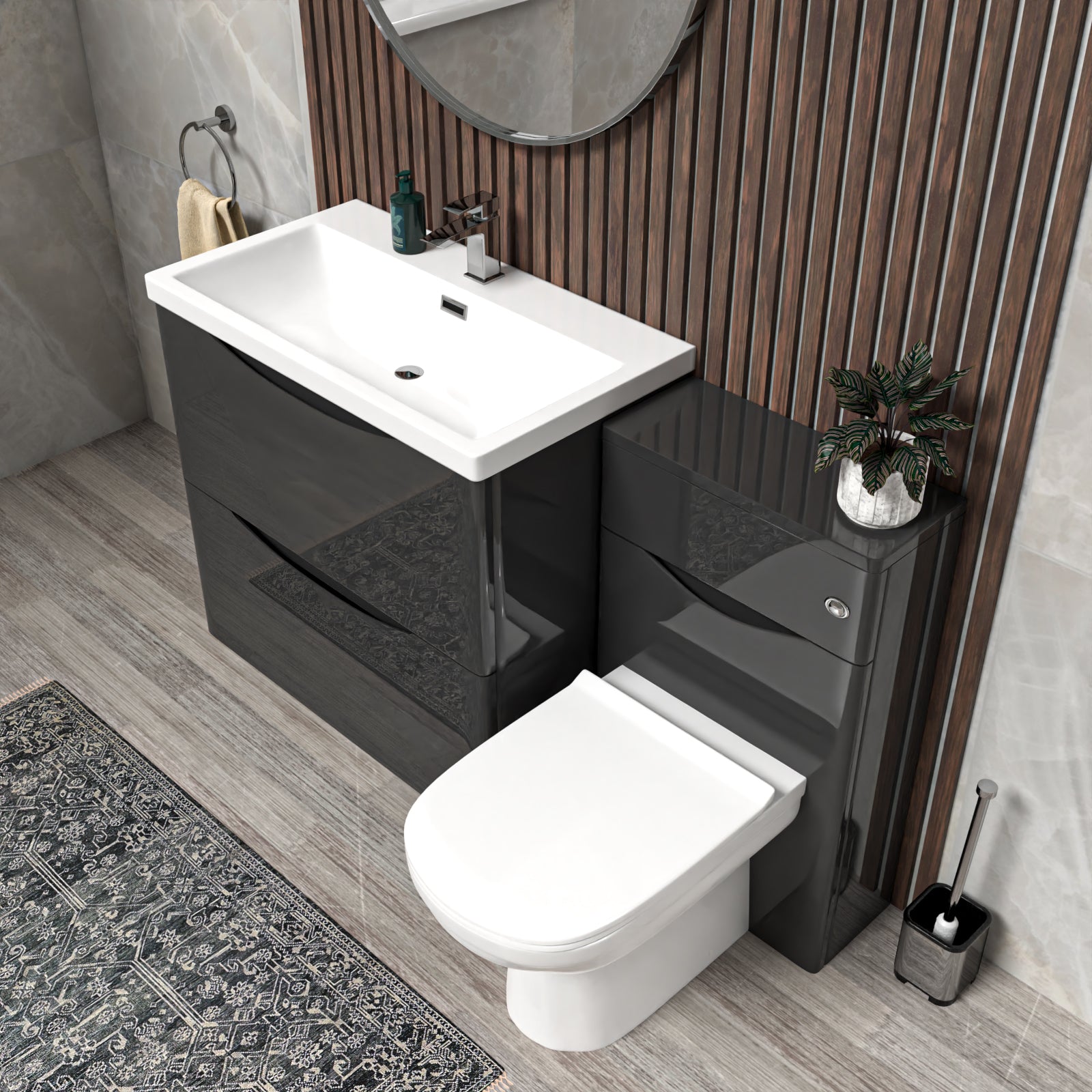 Bathroom setup with black vanity unit, white sink, and toilet.