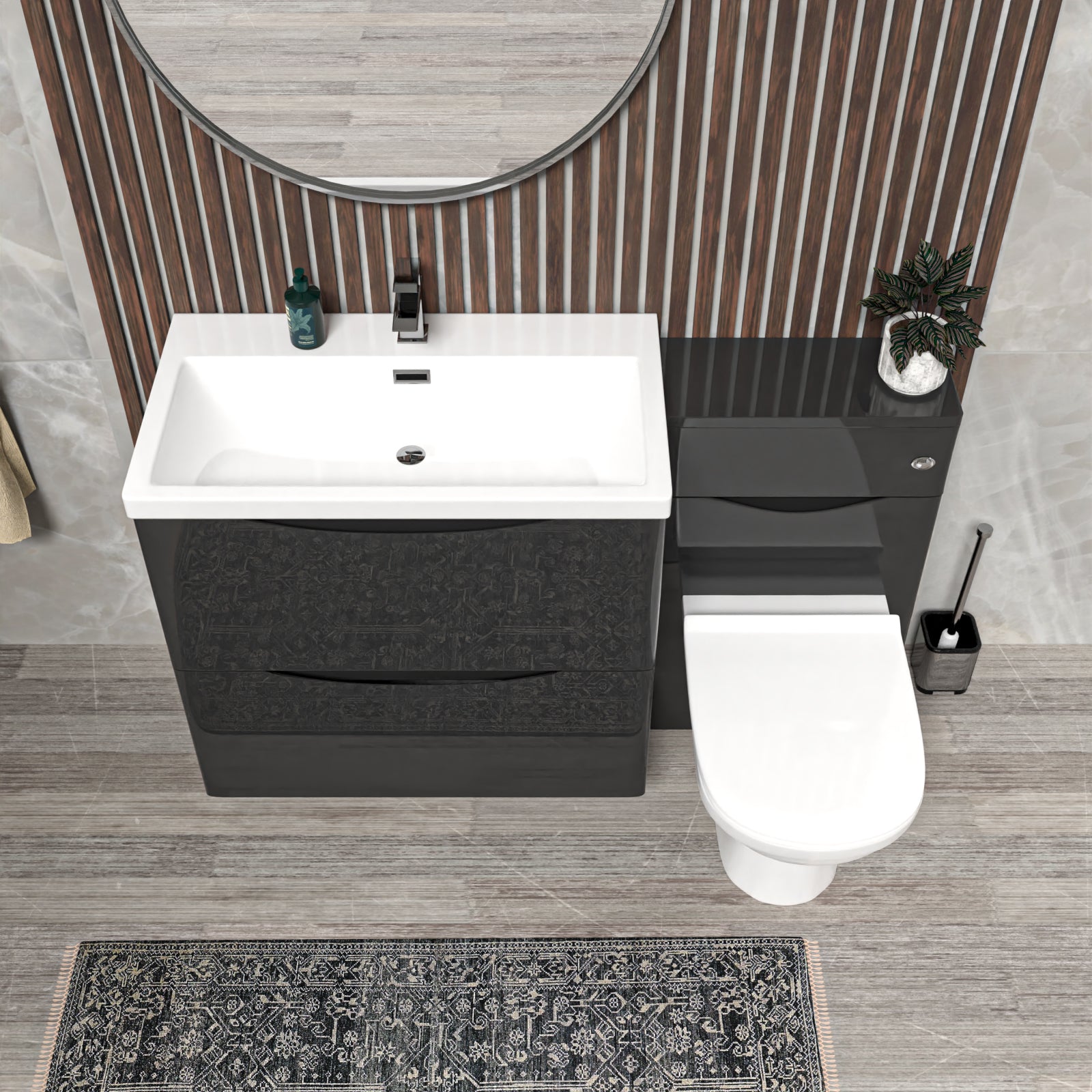 Bathroom setup with black vanity unit, white sink and toilet.