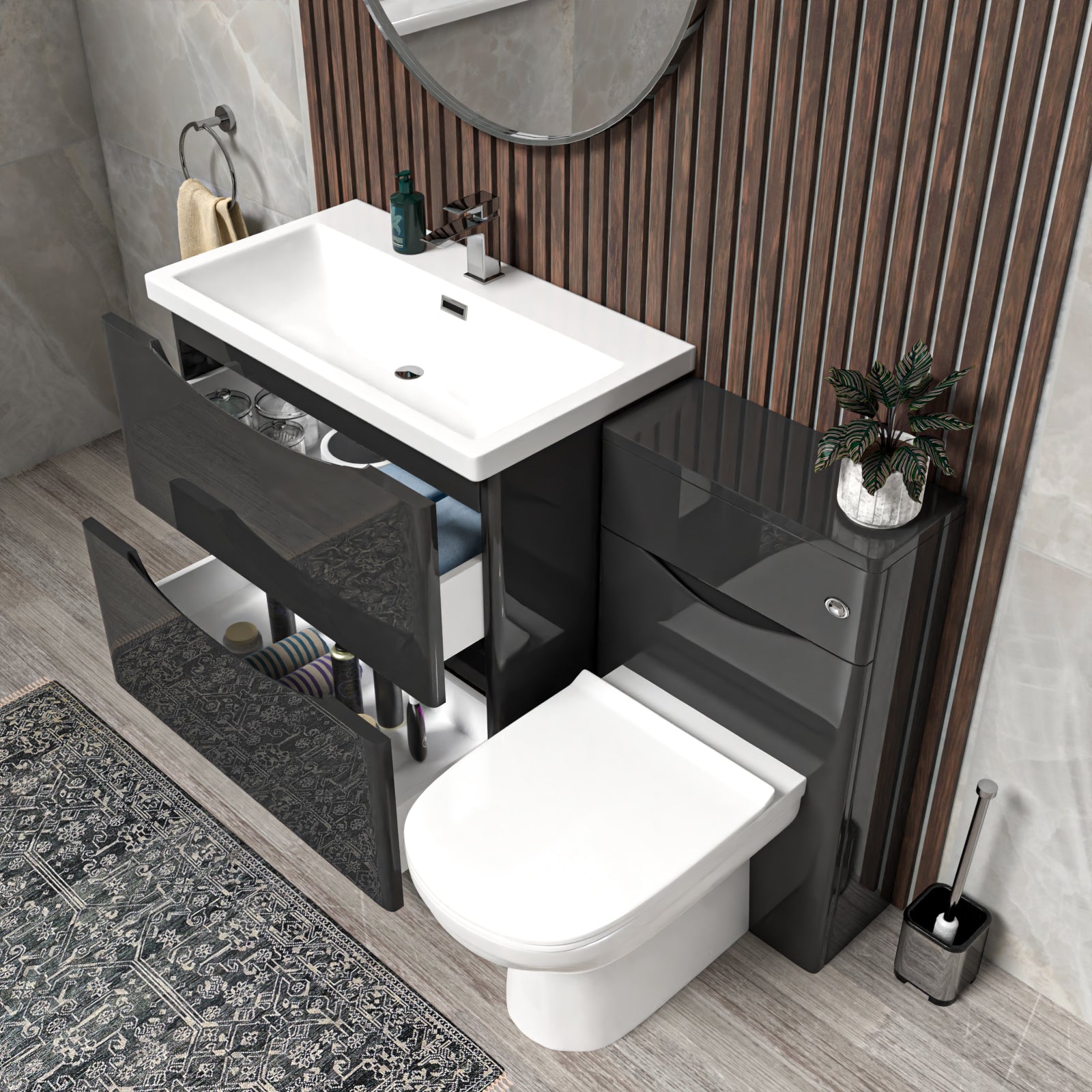 Bathroom setup with a white sink, toilet, and dark vanity unit.