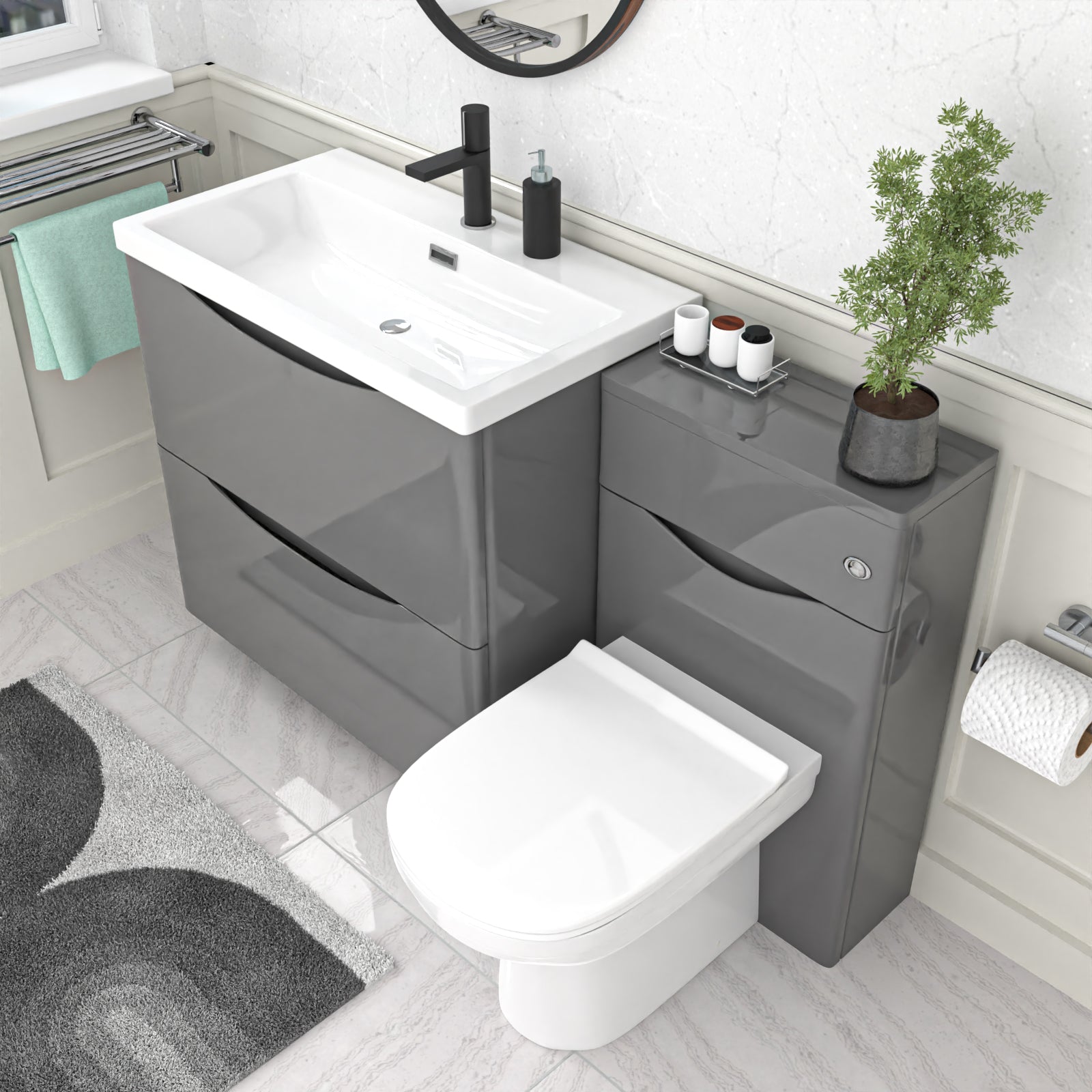bathroom setup with Gray vanity unit, white sink and a toilet