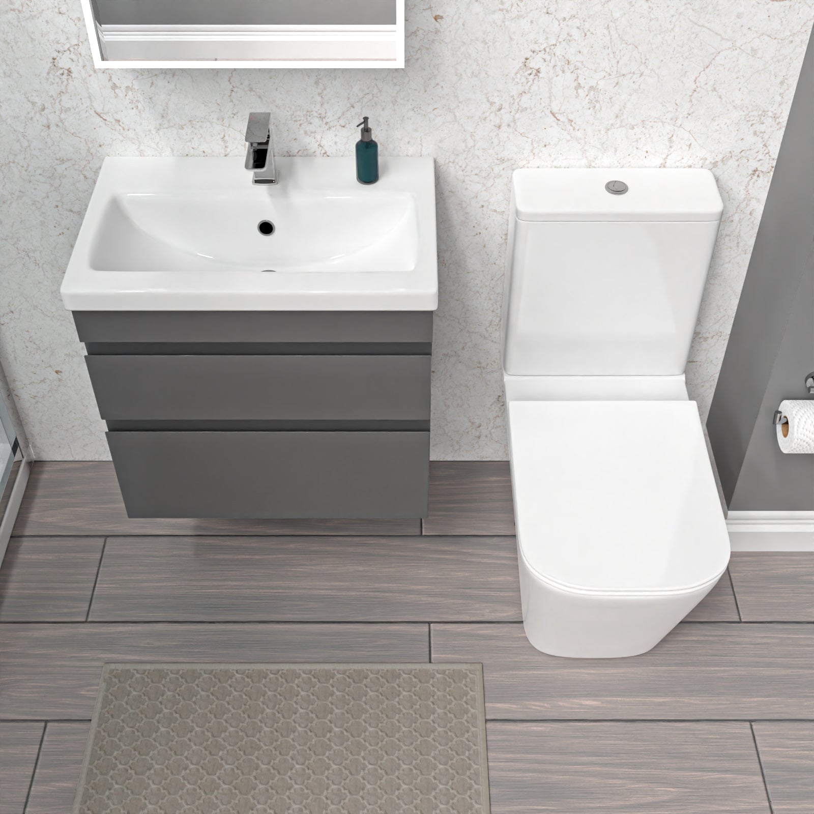 Bathroom setup with a wall hung sink vanity and toilet 