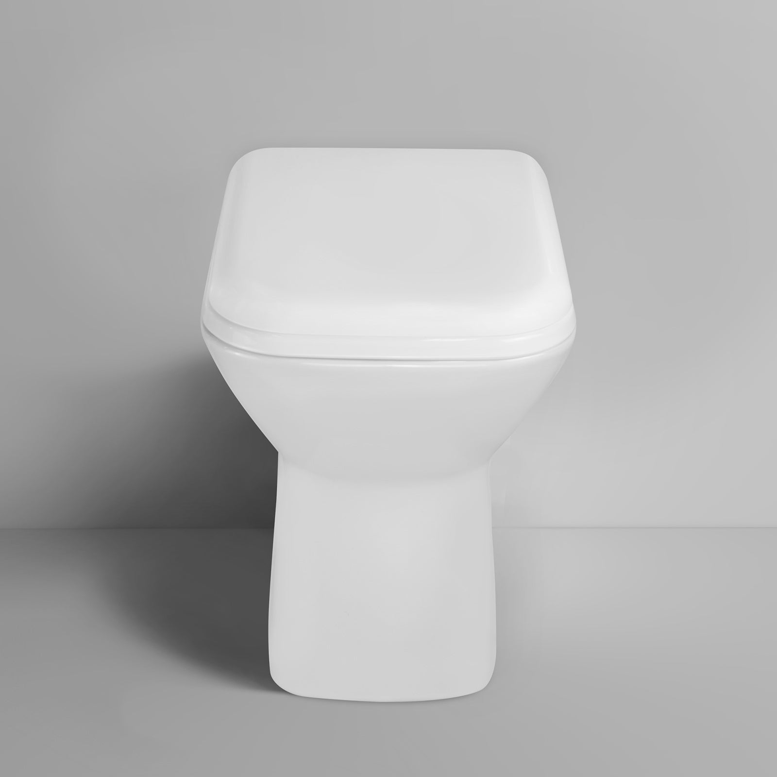 Louis Stylish Back to Wall Rimless Toilet and Soft Close Seat White