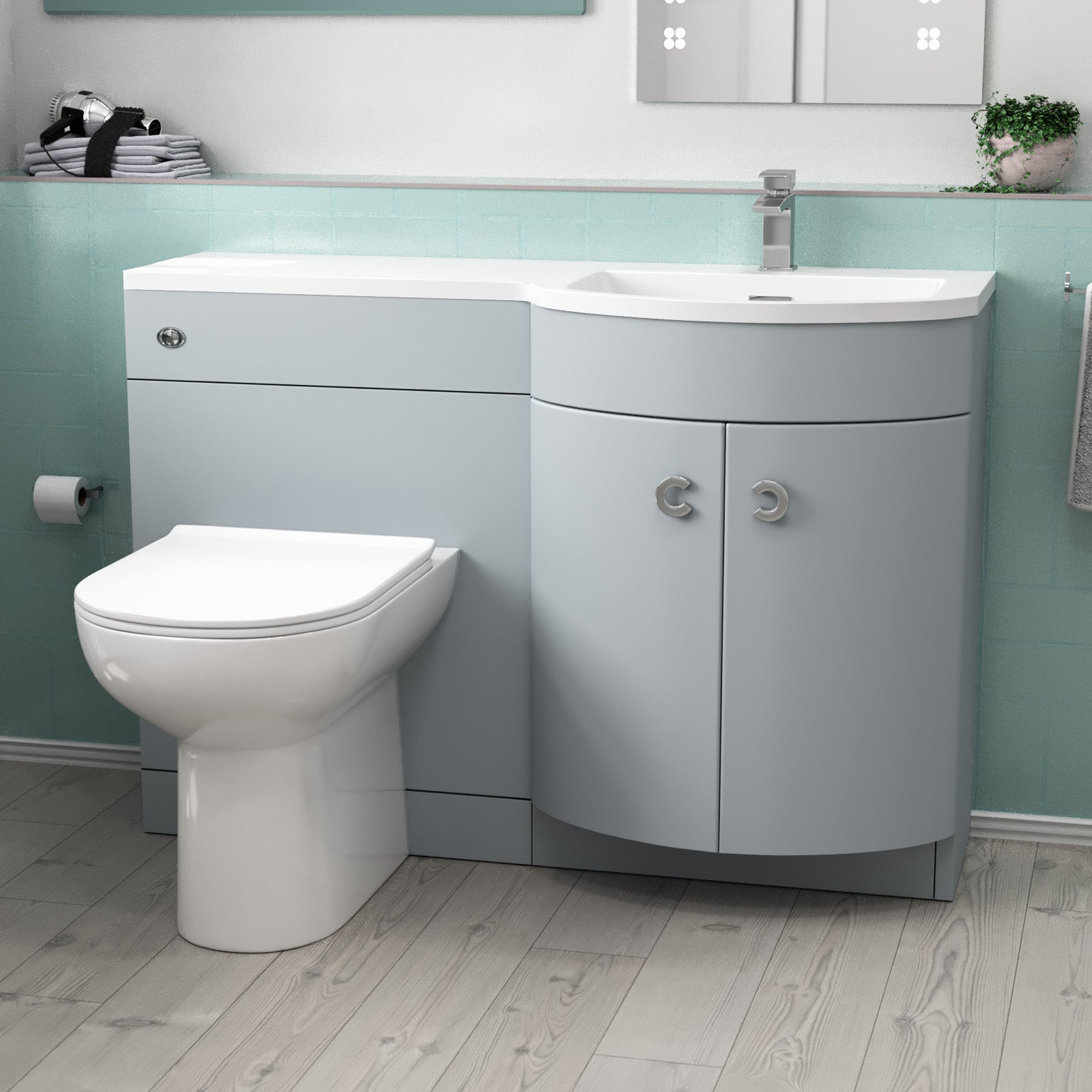 Bathroom setup with a toilet and gray vanity unit