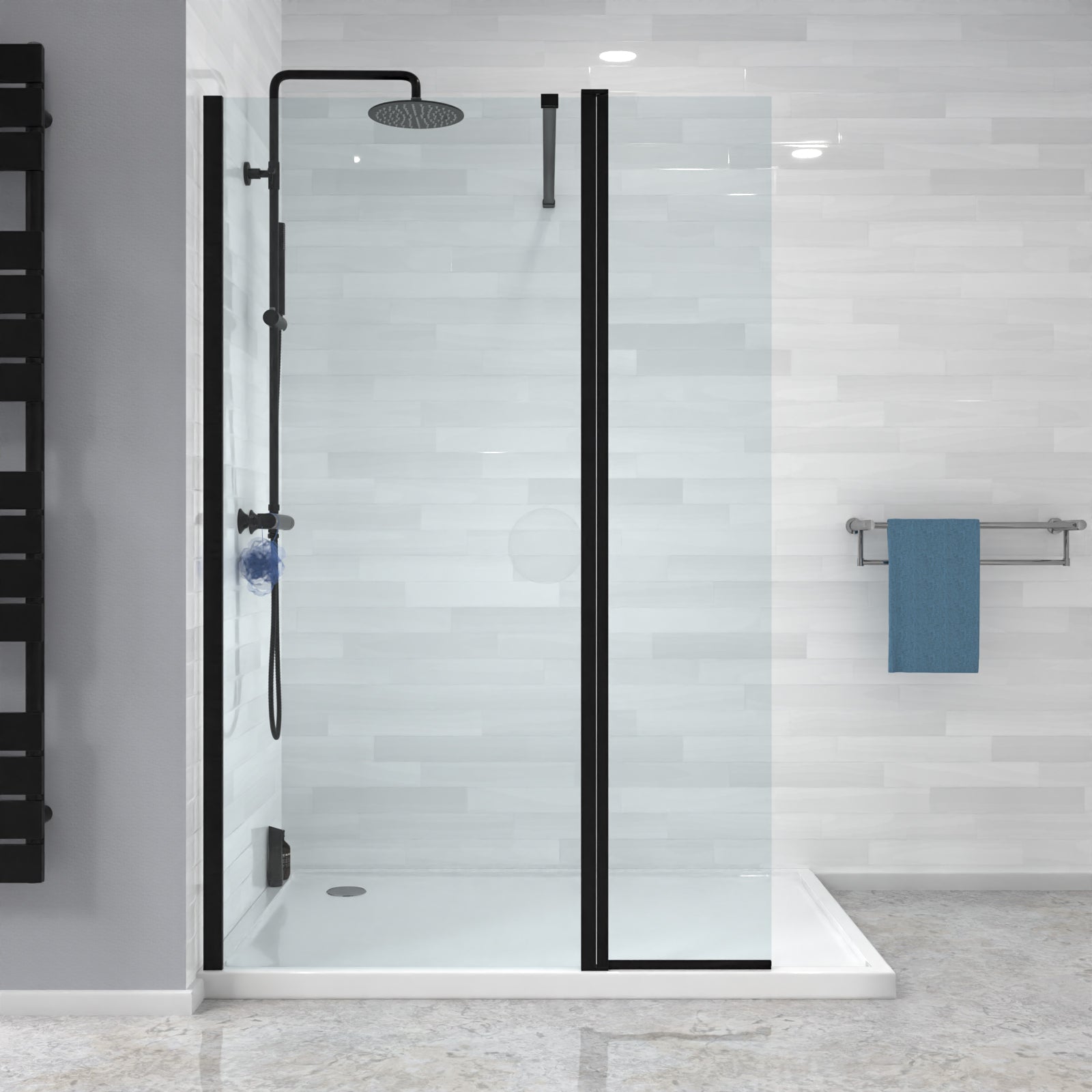 Modern shower setup with glass door, black fixtures