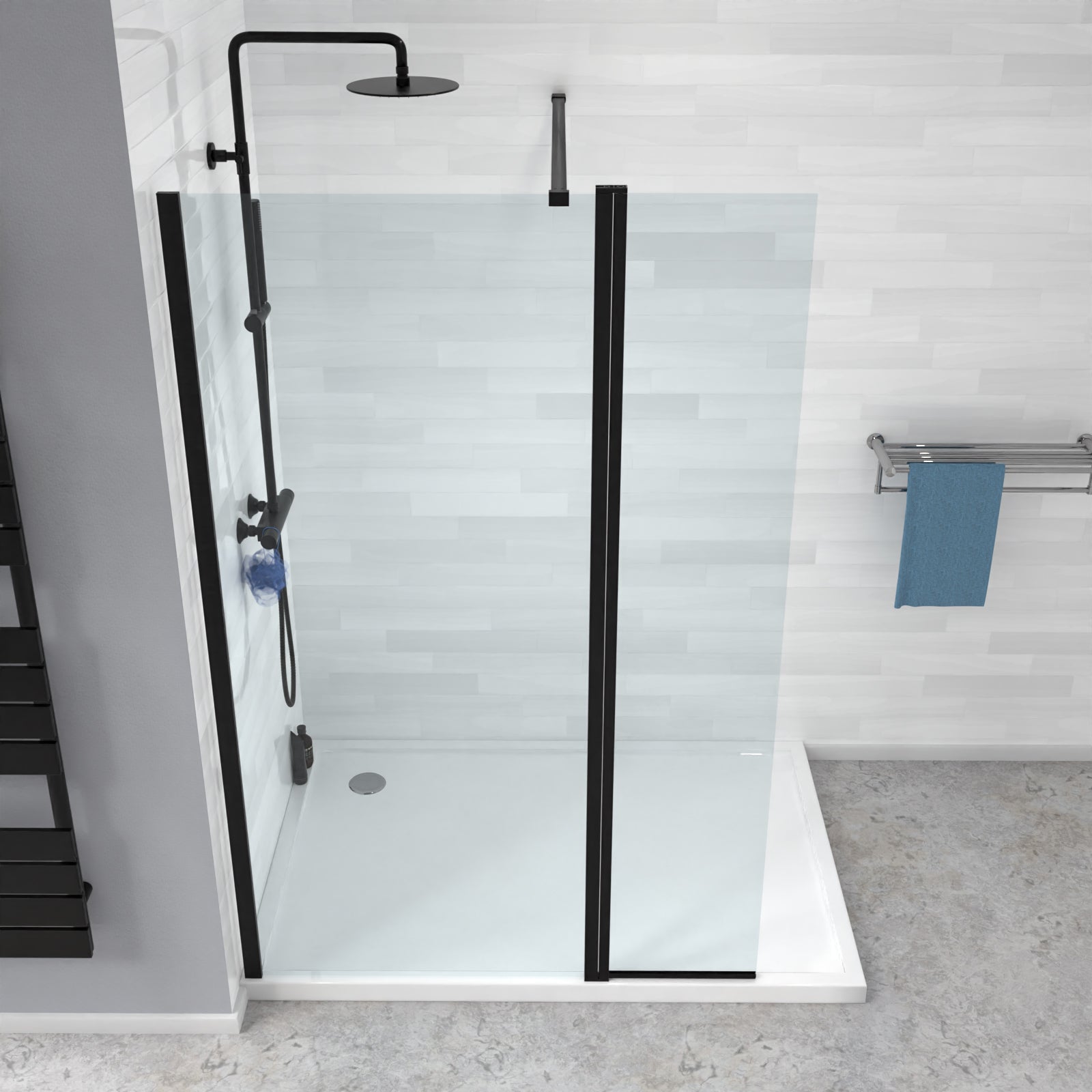 Modern shower setup with glass door, black fixtures