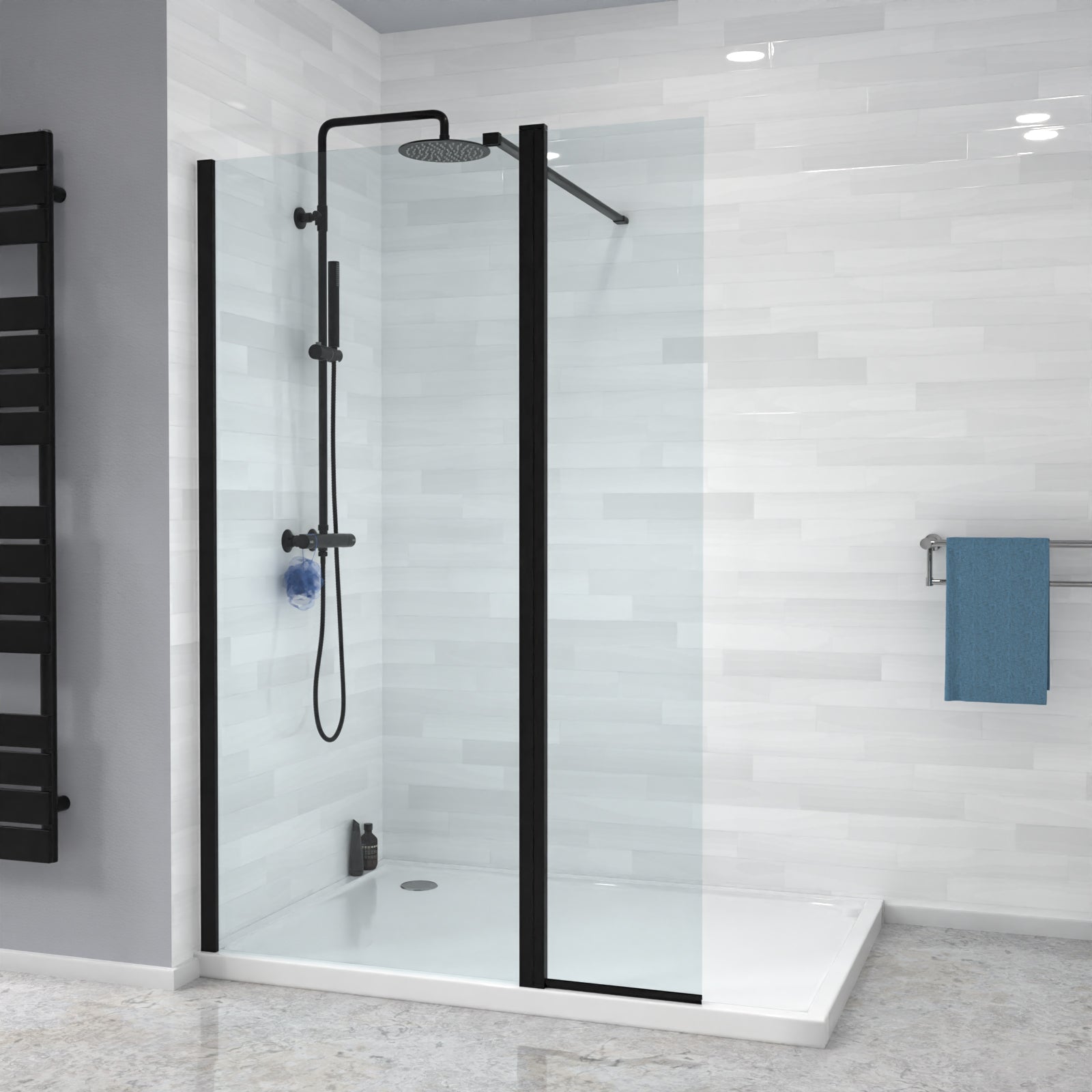 Modern shower setup with black fixtures and glass door in a bathroom.