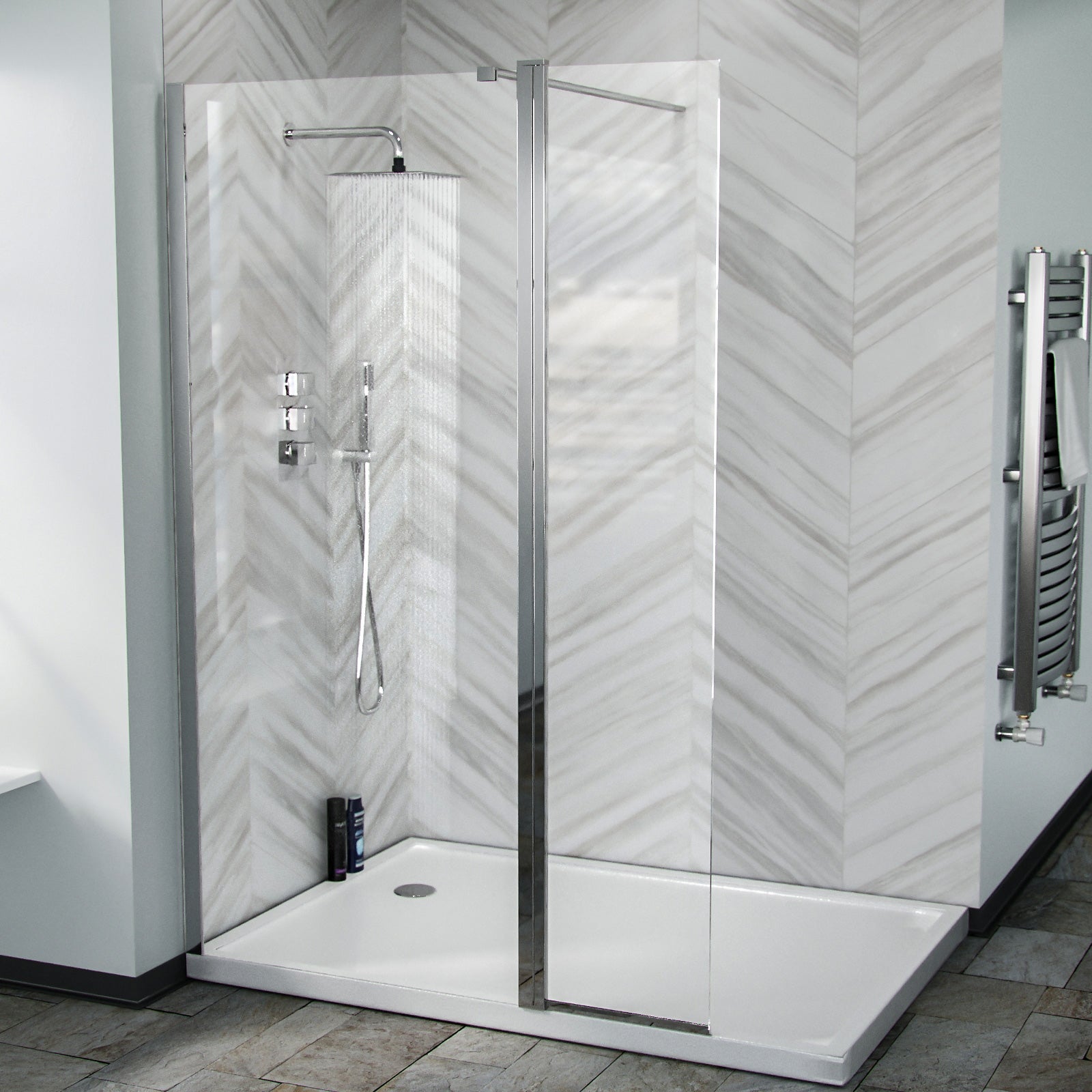Modern shower enclosure with glass door in a bathroom setting